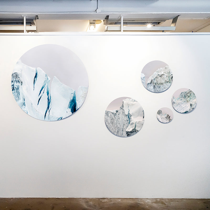 Circular Metal prints on display at exhibition