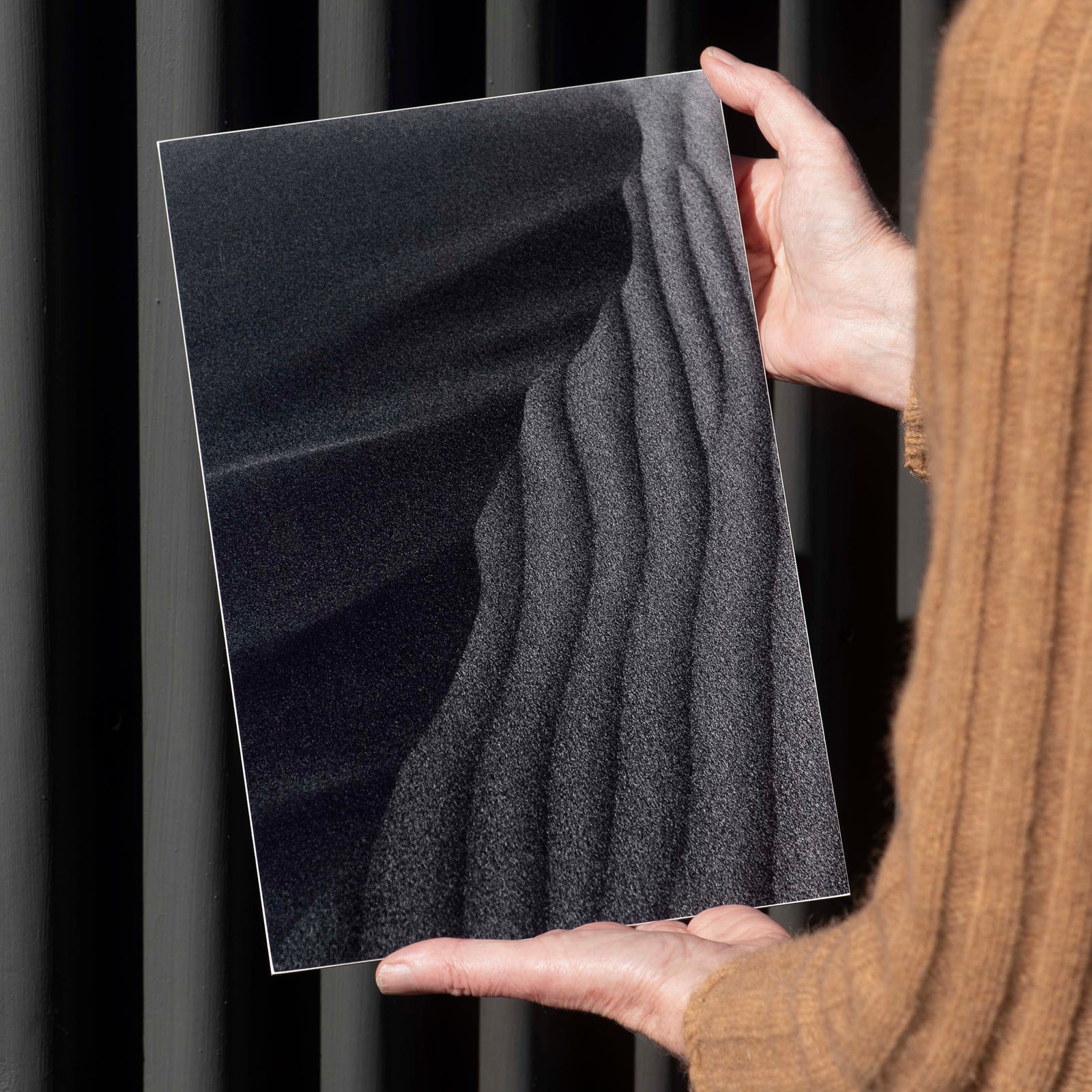 Beautiful outdoor metal print being held to look at