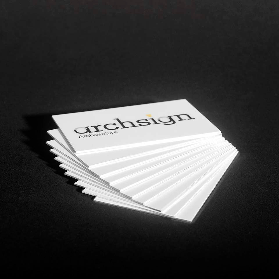 Fanned out business cards printed on metal