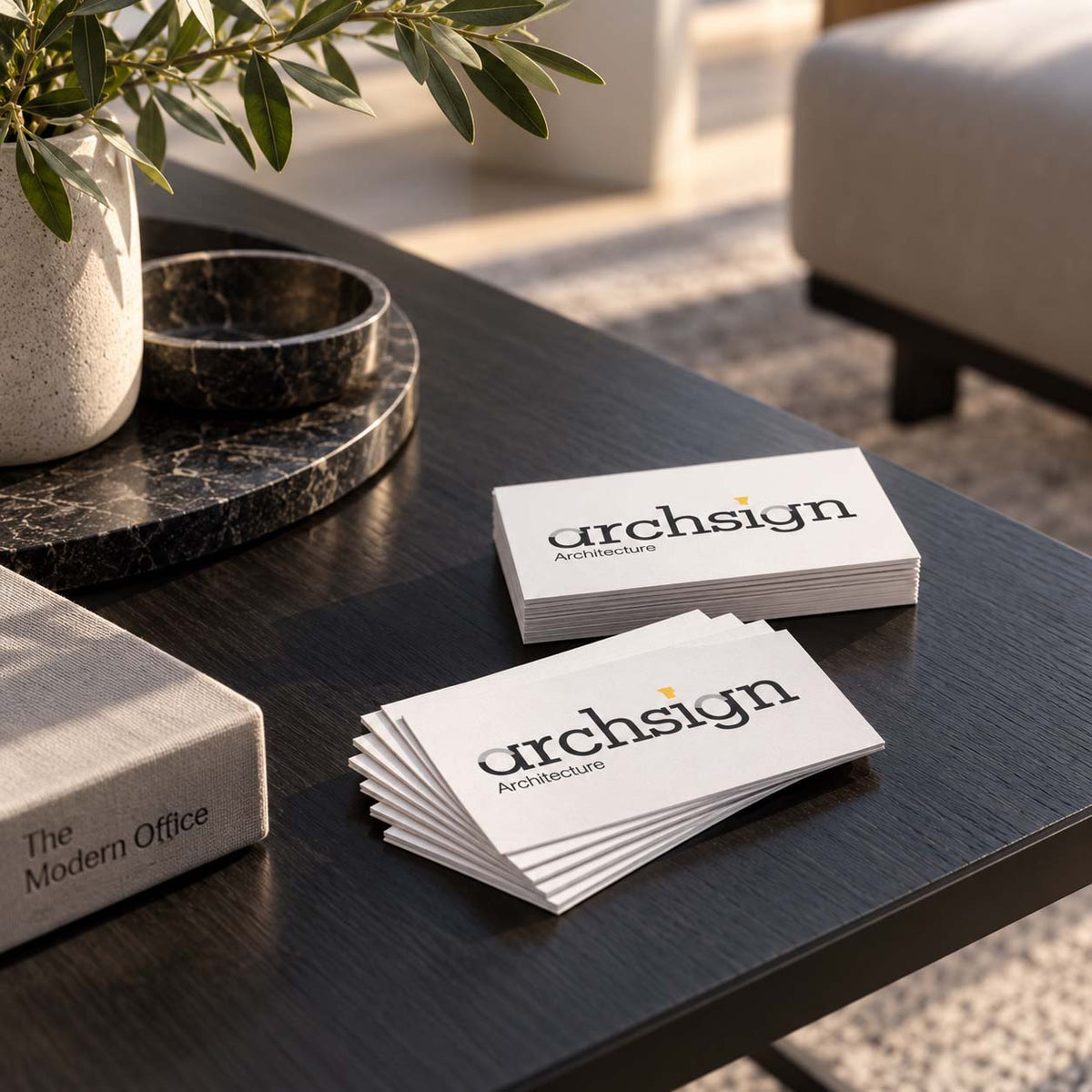 Print 2 Metal branded metal coasters on a side table