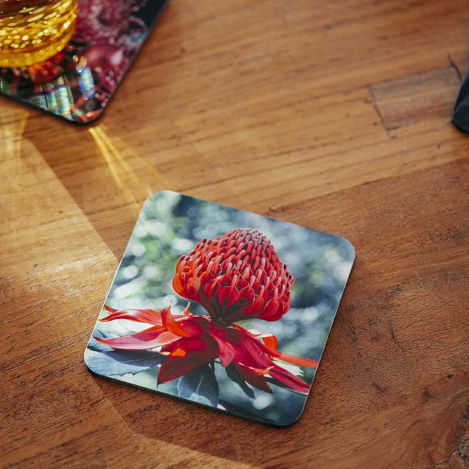 Single custom print coaster on table